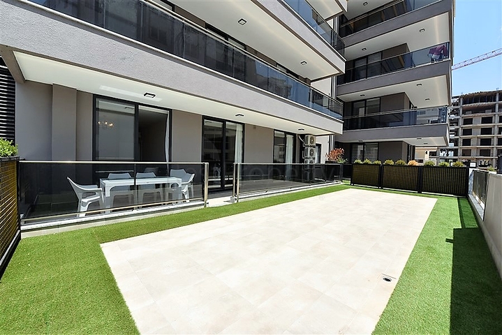 شقة بتصميم غرفتين وصالة  - ضمن مجمع حديث في مهموتلار 