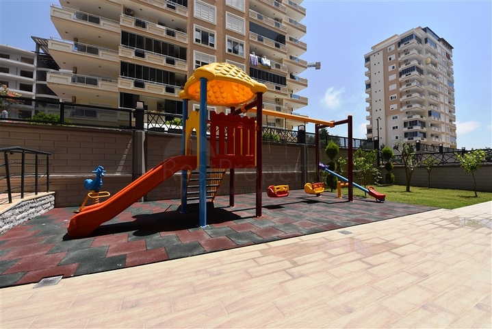 شقة بتصميم غرفتين وصالة  - ضمن مجمع حديث في مهموتلار 