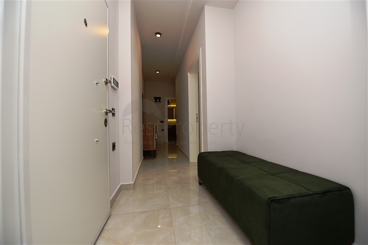 شقة بتصميم غرفتين وصالة  - ضمن مجمع حديث في مهموتلار 