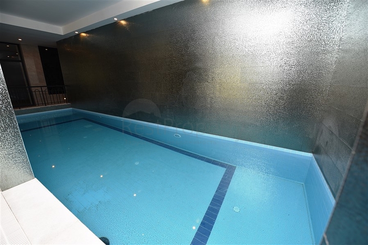 شقة بتصميم غرفتين وصالة  - ضمن مجمع حديث في مهموتلار 