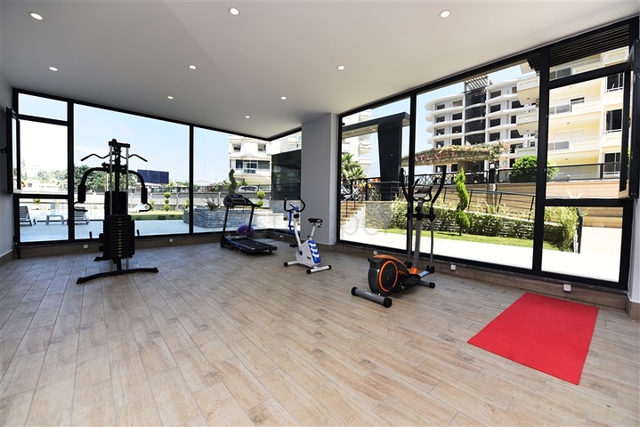 شقة بتصميم غرفتين وصالة  - ضمن مجمع حديث في مهموتلار 