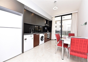 شقة بتصميم غرفتين وصالة  - ضمن مجمع حديث في مهموتلار 