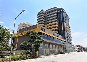 شقة بتصميم غرفتين وصالة  - ضمن مجمع حديث في مهموتلار 