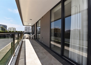 شقة بتصميم غرفتين وصالة  - ضمن مجمع حديث في مهموتلار 