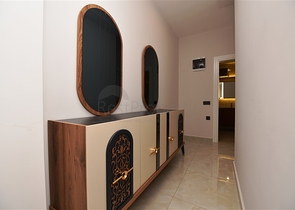 شقة بتصميم غرفتين وصالة  - ضمن مجمع حديث في مهموتلار 