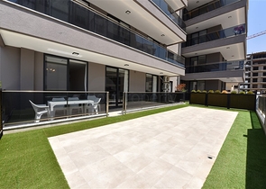 شقة بتصميم غرفتين وصالة  - ضمن مجمع حديث في مهموتلار 