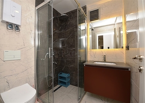 شقة بتصميم غرفتين وصالة  - ضمن مجمع حديث في مهموتلار 