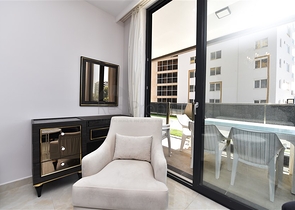 شقة بتصميم غرفتين وصالة  - ضمن مجمع حديث في مهموتلار 