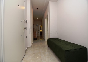 شقة بتصميم غرفتين وصالة  - ضمن مجمع حديث في مهموتلار 