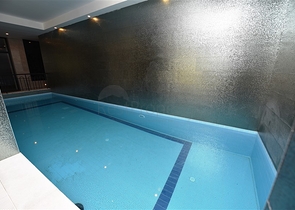 شقة بتصميم غرفتين وصالة  - ضمن مجمع حديث في مهموتلار 