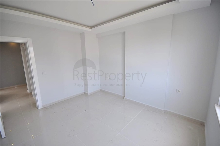 غرفتي نوم وصالة ضمن مجمع سكني في مهموتلار -بسعر جيد 