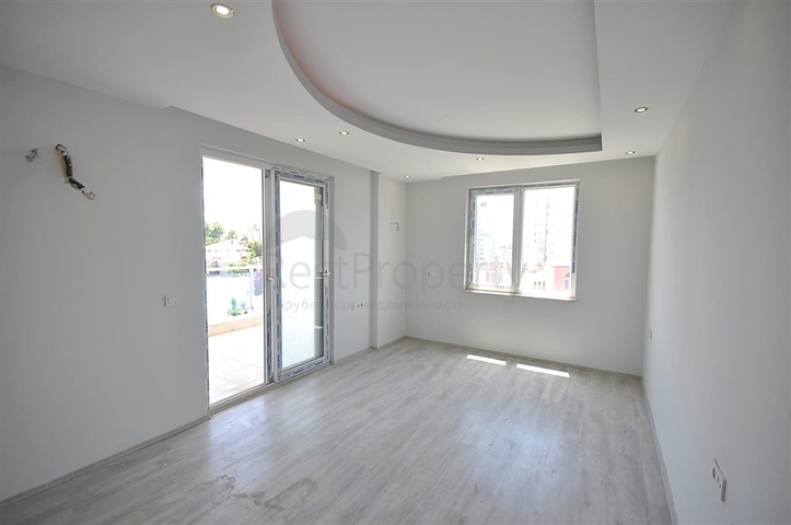 غرفتي نوم وصالة ضمن مجمع سكني في مهموتلار -بسعر جيد 