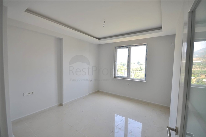 غرفتي نوم وصالة ضمن مجمع سكني في مهموتلار -بسعر جيد 