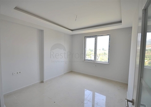 غرفتي نوم وصالة ضمن مجمع سكني في مهموتلار -بسعر جيد 