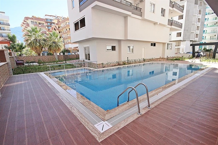 شقة غرفتين وصالة ضمن مجمع حديث قريب من الشاطئ في مهموتلار / الانيا 