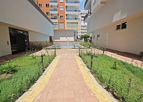 شقة غرفتين وصالة ضمن مجمع حديث قريب من الشاطئ في مهموتلار / الانيا 