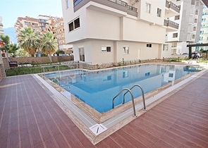 شقة غرفتين وصالة ضمن مجمع حديث قريب من الشاطئ في مهموتلار / الانيا 