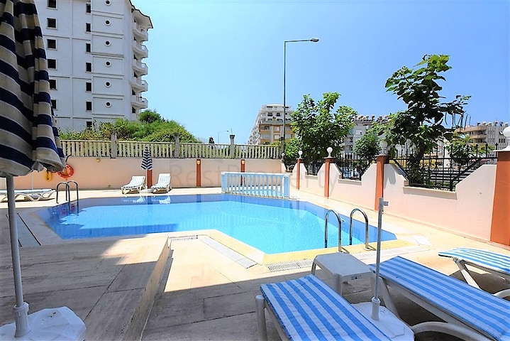 غرفة نوم وصالة مؤثثة في منطقة مركزية في اوبا 