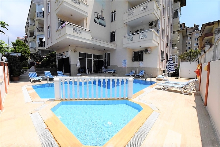 غرفة نوم وصالة مؤثثة في منطقة مركزية في اوبا 