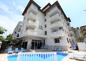 غرفة نوم وصالة مؤثثة في منطقة مركزية في اوبا 