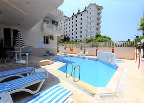 غرفة نوم وصالة مؤثثة في منطقة مركزية في اوبا 