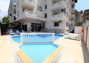 غرفة نوم وصالة مؤثثة في منطقة مركزية في اوبا 