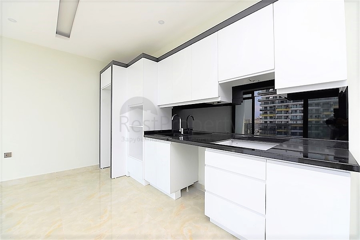 اطلالة بحرية مباشرة -شقة من تصميم غرفة وصالة ضمن مجمع سكني حديث في مهموتلار - الانيا 