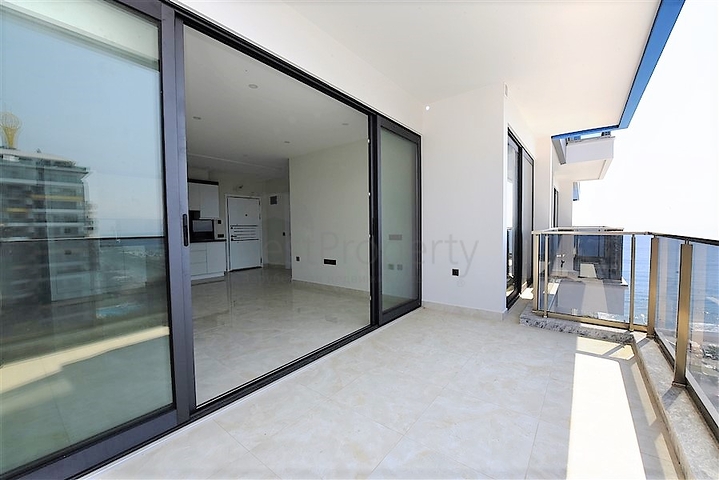 اطلالة بحرية مباشرة -شقة من تصميم غرفة وصالة ضمن مجمع سكني حديث في مهموتلار - الانيا 