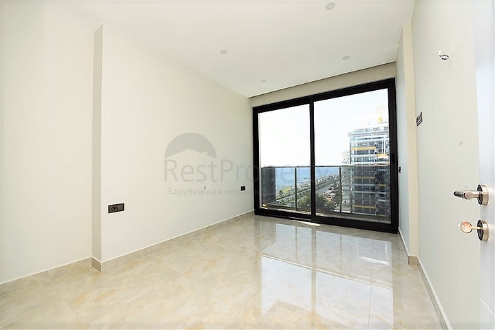 اطلالة بحرية مباشرة -شقة من تصميم غرفة وصالة ضمن مجمع سكني حديث في مهموتلار - الانيا 