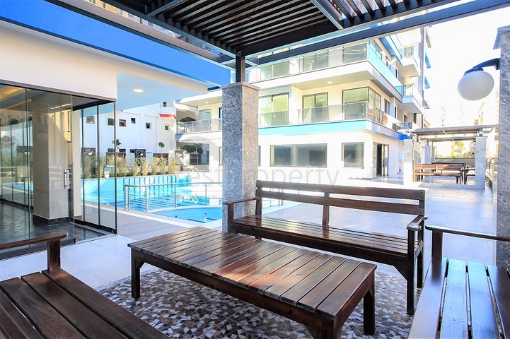 اطلالة بحرية مباشرة -شقة من تصميم غرفة وصالة ضمن مجمع سكني حديث في مهموتلار - الانيا 