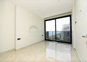 اطلالة بحرية مباشرة -شقة من تصميم غرفة وصالة ضمن مجمع سكني حديث في مهموتلار - الانيا 