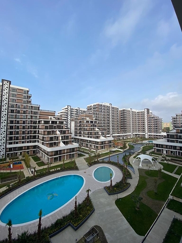 بالتقسيط - شقق ضمن مجمع سكني حديث في بيلك دوزو / اسطنبول 