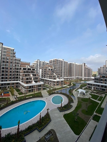 بالتقسيط - شقق ضمن مجمع سكني حديث في بيلك دوزو / اسطنبول 