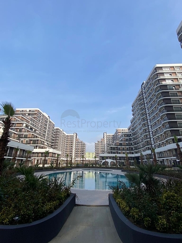 بالتقسيط - شقق ضمن مجمع سكني حديث في بيلك دوزو / اسطنبول 