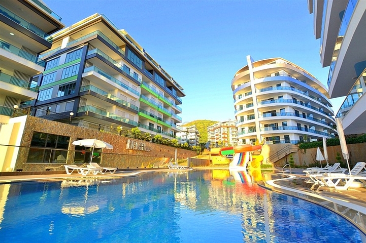 اطلالة بحرية مباشرة- شقة مؤثثة تصميم غرفة  نوم وصالة ضمن مجمع سكني حديث في كاركي جاك - الانيا 