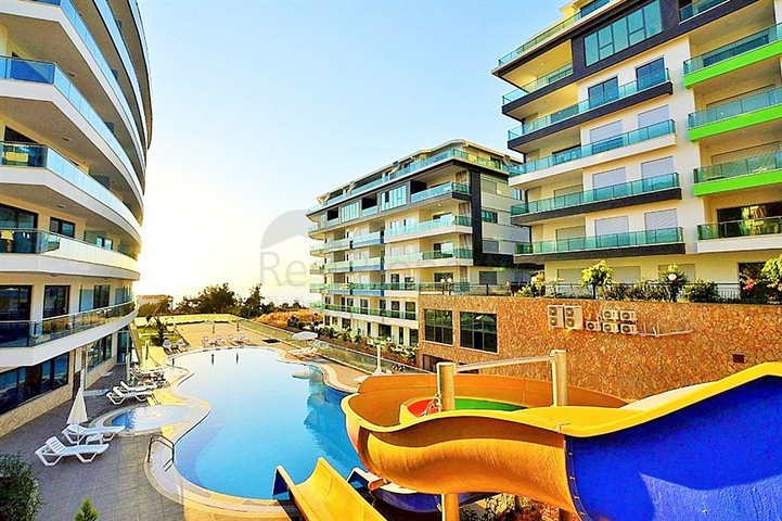 اطلالة بحرية مباشرة- شقة مؤثثة تصميم غرفة  نوم وصالة ضمن مجمع سكني حديث في كاركي جاك - الانيا 