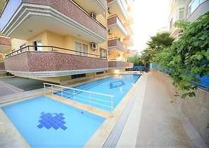 شقة عائلية واسعة من تصميم غرفتين وصالة في الانيا - مهموتلار 