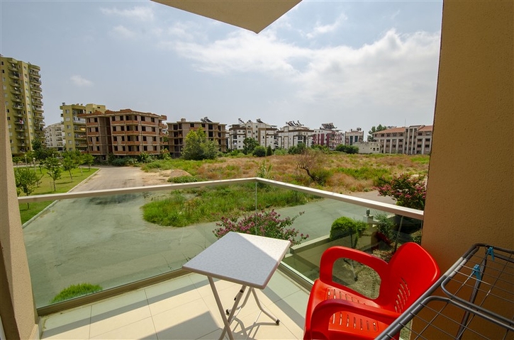 شقة بغرفة نوم واحدة مع أثاث في مجمع مخطط شقق فندقيه