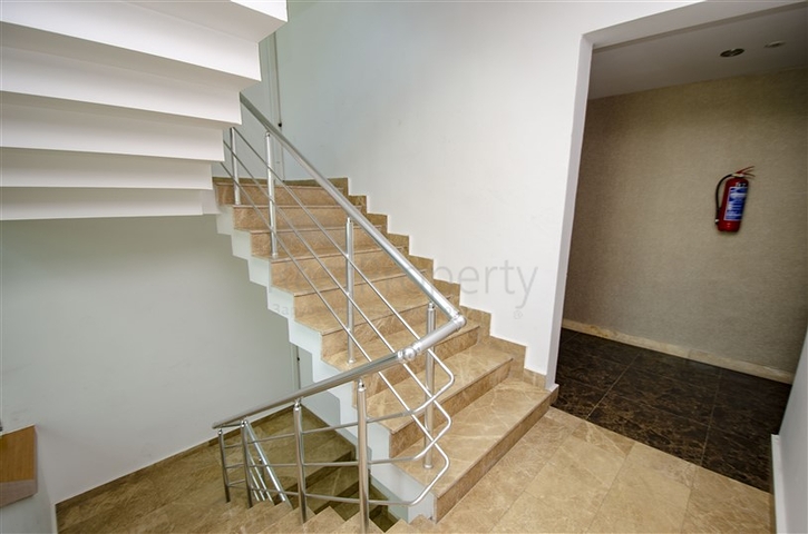 شقة بغرفة نوم واحدة مع أثاث في مجمع مخطط شقق فندقيه