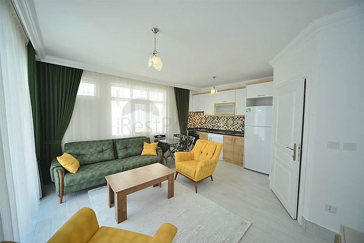 اول صف على البحر - شقة مؤثثة من تصميم غرفتين وصالة في مهموتلار / الانيا 