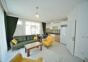 اول صف على البحر - شقة مؤثثة من تصميم غرفتين وصالة في مهموتلار / الانيا 