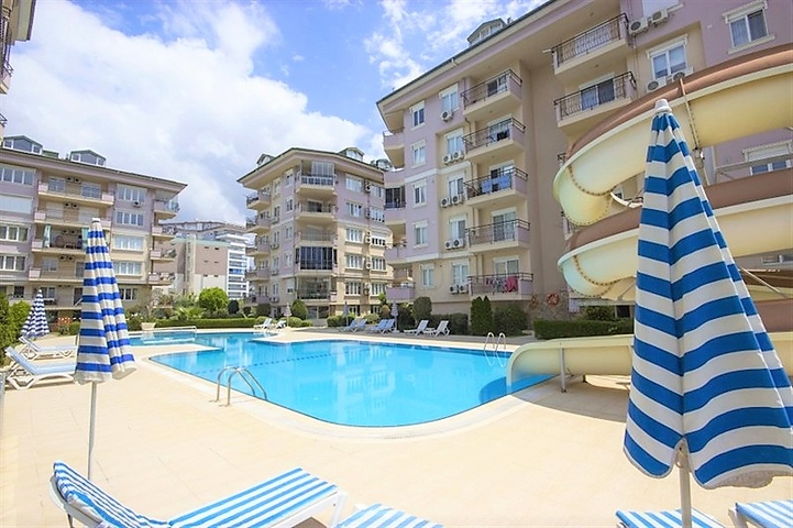 شقة غرفتين وصالة مفروشة ضمن مجمع سكني جنب مول الانيوم - اوبا / الانيا 