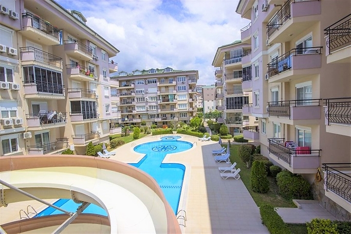 شقة غرفتين وصالة مفروشة ضمن مجمع سكني جنب مول الانيوم - اوبا / الانيا 