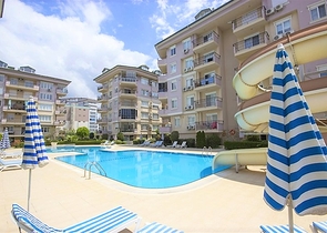 شقة غرفتين وصالة مفروشة ضمن مجمع سكني جنب مول الانيوم - اوبا / الانيا 