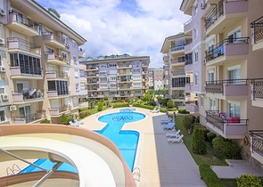 شقة غرفتين وصالة مفروشة ضمن مجمع سكني جنب مول الانيوم - اوبا / الانيا 