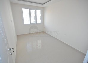 شقة غرفتين وصالة بمطبخ منفصل ضمن مجمع حديث في مهموتلار / الانيا 