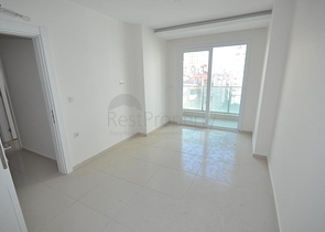 شقة غرفتين وصالة بمطبخ منفصل ضمن مجمع حديث في مهموتلار / الانيا 