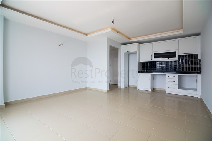 شقة غرفة وصالة ضمن مجمع سكني في مهموتلار / الانيا 