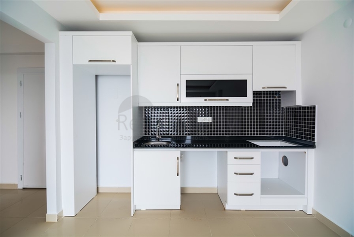 شقة غرفة وصالة ضمن مجمع سكني في مهموتلار / الانيا 