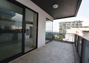 ضمن مجمع سكني خط اول على البحر - شقة غرفتين وصالة 